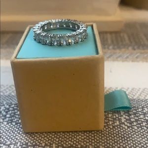 Oval shaped sterling silver Eternity wedding band.